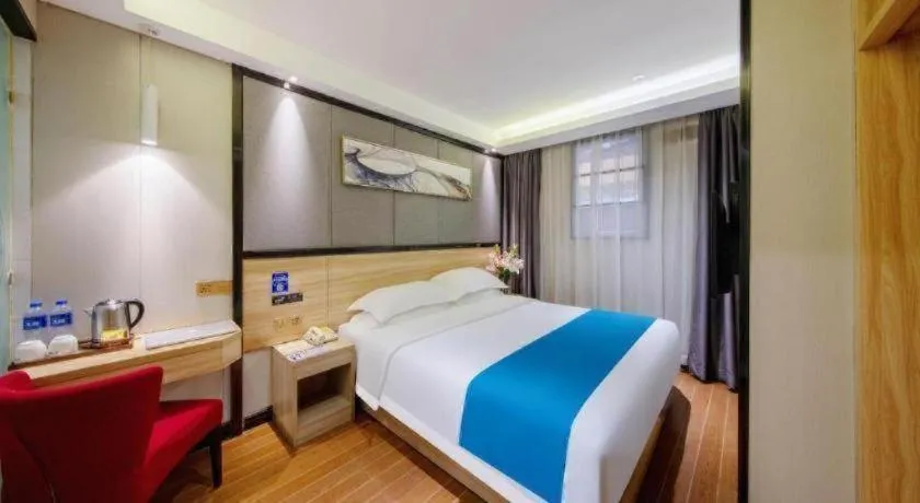 Bed in Wenxing Hotel Guangzhou Gangding Metro Station Branch