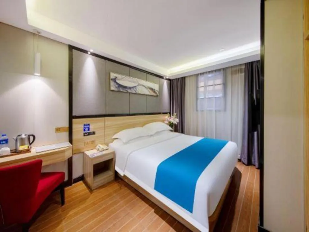 Bed in Wenxing Hotel Guangzhou Gangding Metro Station Branch