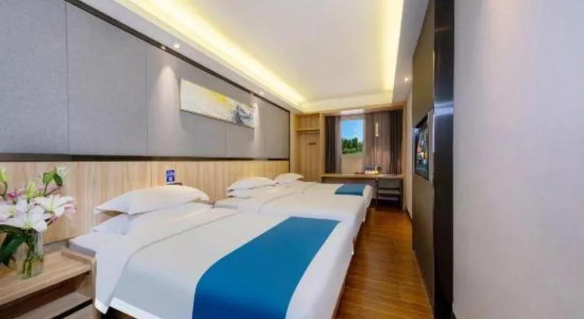 Bed in Wenxing Hotel Guangzhou Gangding Metro Station Branch