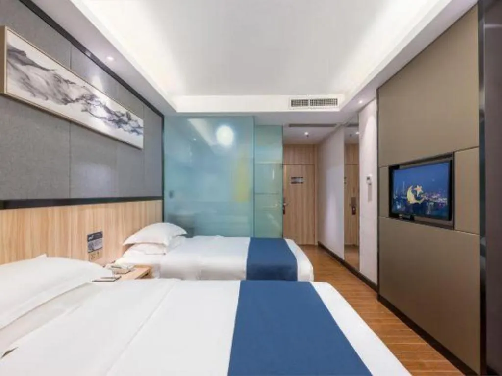 Bed in Wenxing Hotel Guangzhou Gangding Metro Station Branch