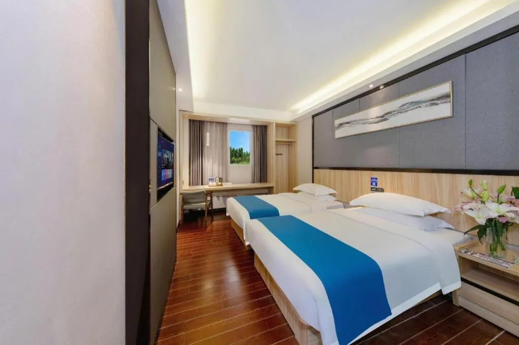 Bed in Wenxing Hotel Guangzhou Gangding Metro Station Branch