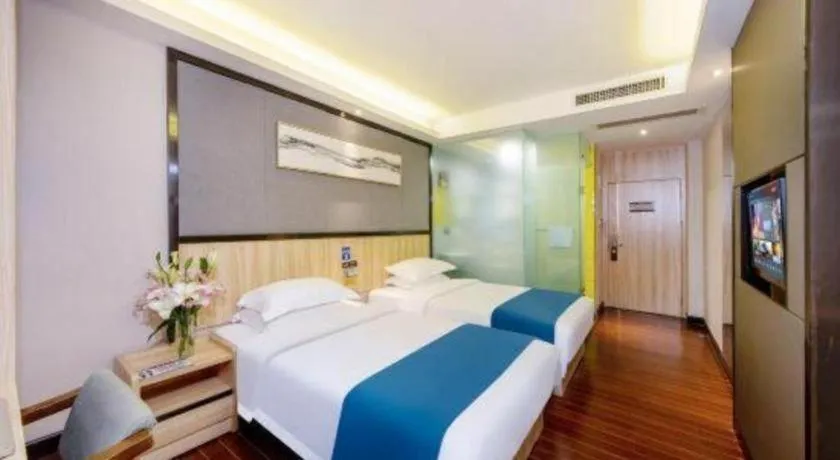 Bed in Wenxing Hotel Guangzhou Gangding Metro Station Branch