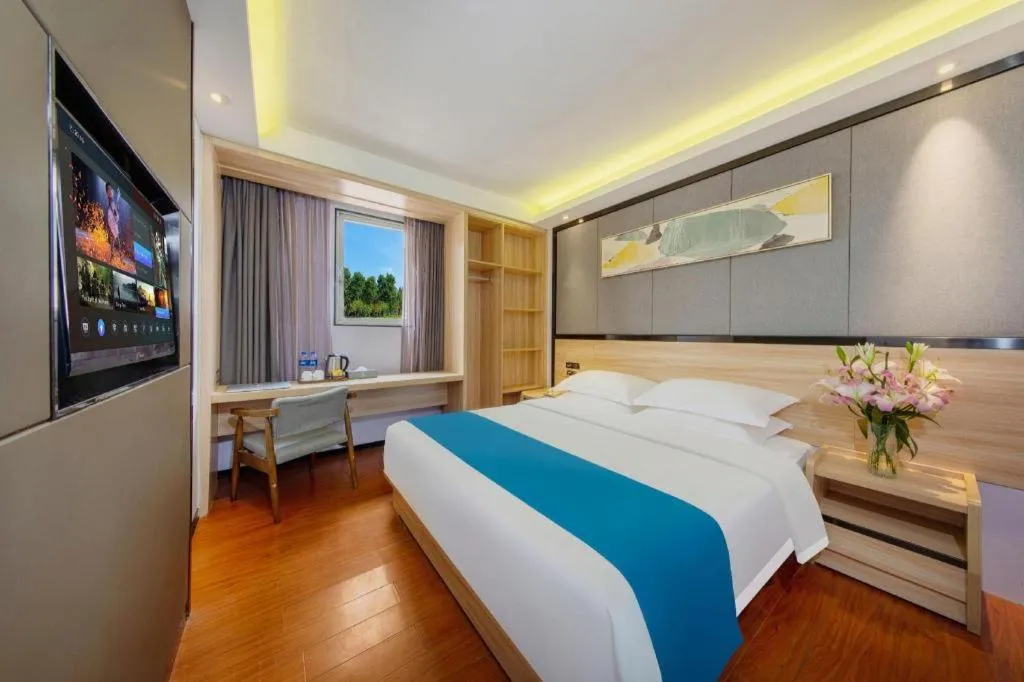 Bed in Wenxing Hotel Guangzhou Gangding Metro Station Branch