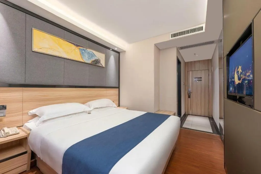 Bed in Wenxing Hotel Guangzhou Gangding Metro Station Branch