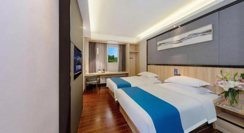 Bed in Wenxing Hotel Guangzhou Gangding Metro Station Branch