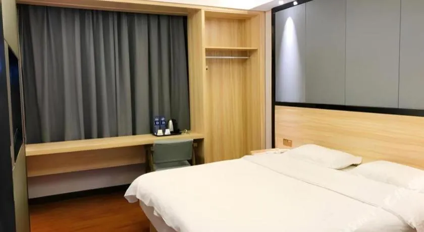 Bed in Wenxing Hotel Guangzhou Gangding Metro Station Branch