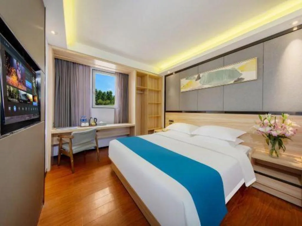 Bed in Wenxing Hotel Guangzhou Gangding Metro Station Branch