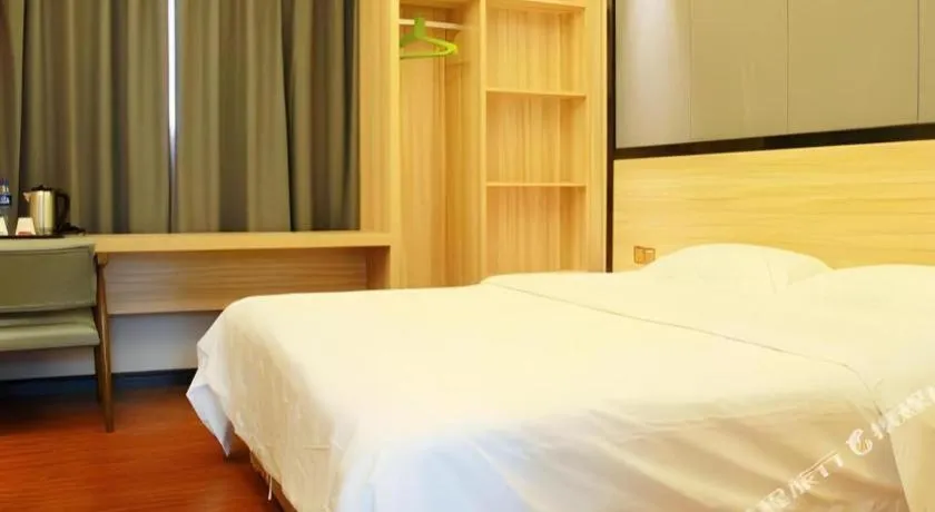 Bed in Wenxing Hotel Guangzhou Gangding Metro Station Branch