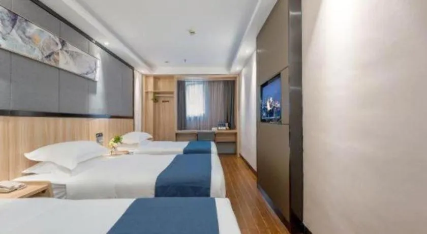 Bed in Wenxing Hotel Guangzhou Gangding Metro Station Branch