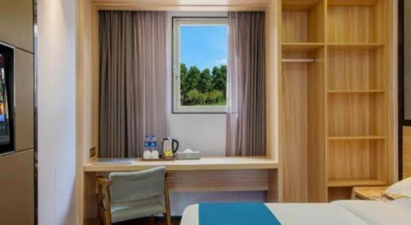 Bed in Wenxing Hotel Guangzhou Gangding Metro Station Branch