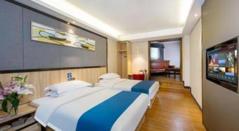 Bed in Wenxing Hotel Guangzhou Gangding Metro Station Branch