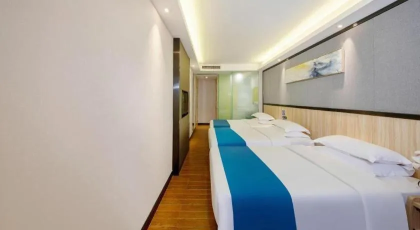 Bed in Wenxing Hotel Guangzhou Gangding Metro Station Branch