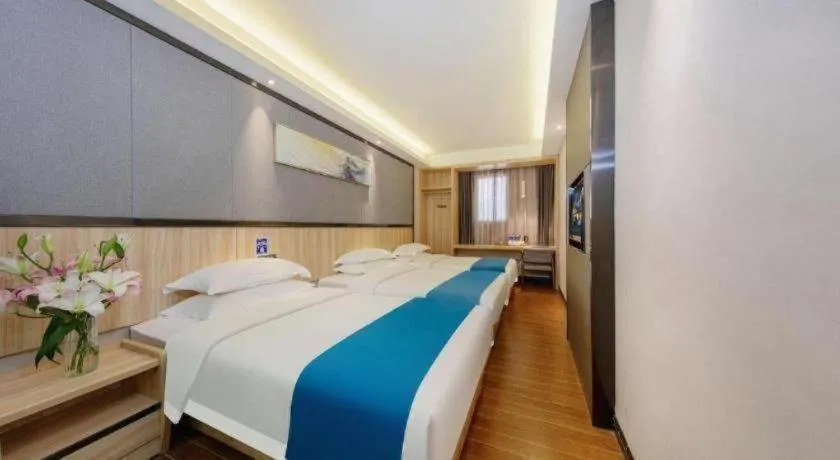 Bed in Wenxing Hotel Guangzhou Gangding Metro Station Branch