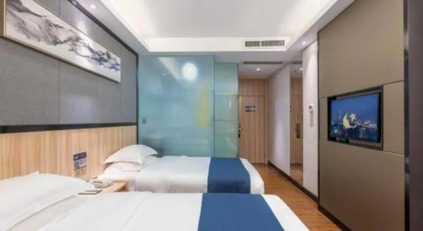 Bed in Wenxing Hotel Guangzhou Gangding Metro Station Branch