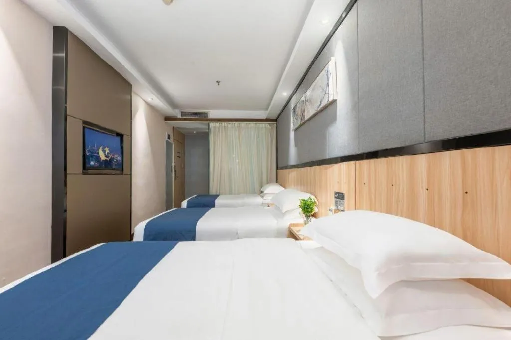 Bed in Wenxing Hotel Guangzhou Gangding Metro Station Branch