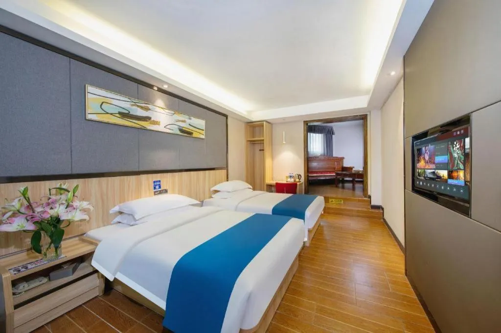 Bed in Wenxing Hotel Guangzhou Gangding Metro Station Branch