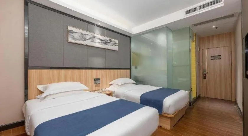 Bed in Wenxing Hotel Guangzhou Gangding Metro Station Branch