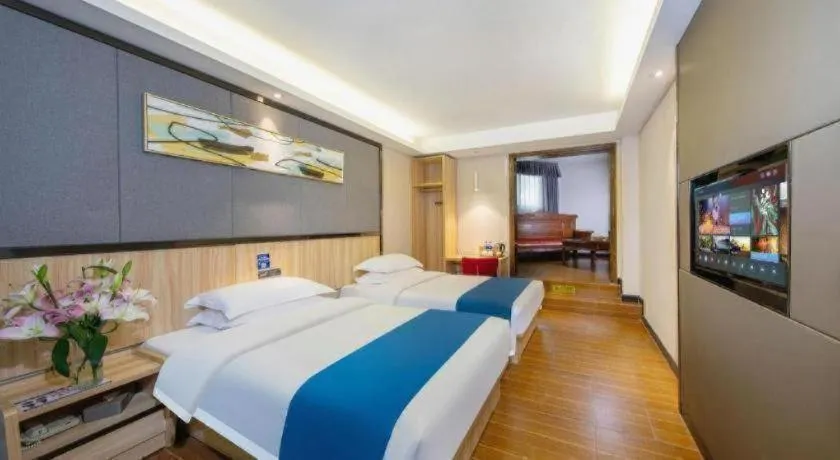 Bed in Wenxing Hotel Guangzhou Gangding Metro Station Branch