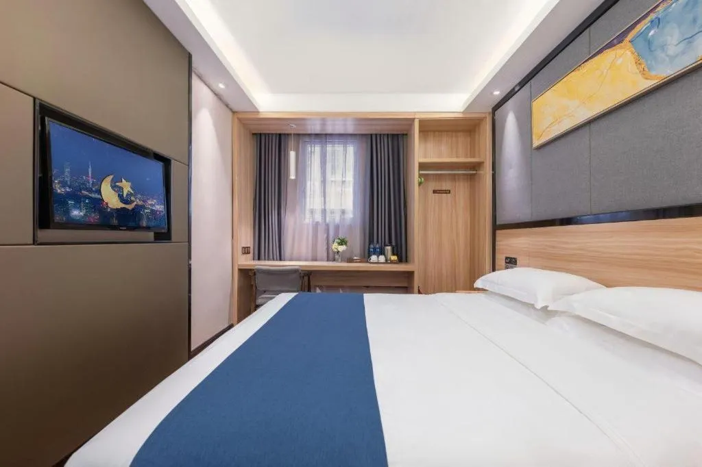 Bed in Wenxing Hotel Guangzhou Gangding Metro Station Branch