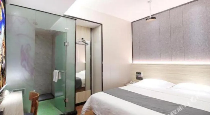 Bed in Wenxing Hotel Guangzhou Gangding Metro Station Branch