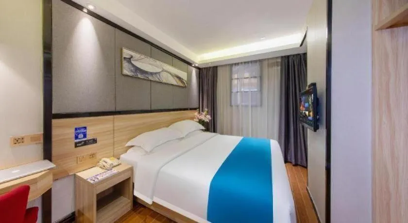 Bed in Wenxing Hotel Guangzhou Gangding Metro Station Branch