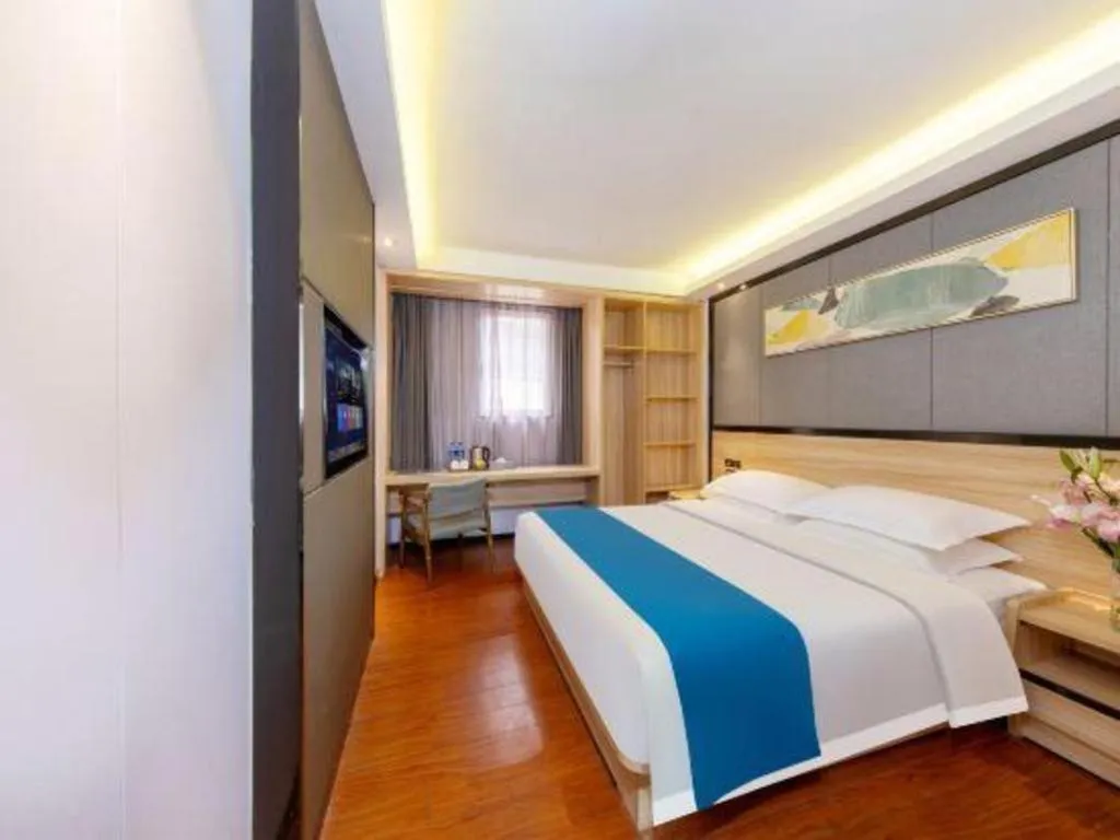 Bed in Wenxing Hotel Guangzhou Gangding Metro Station Branch