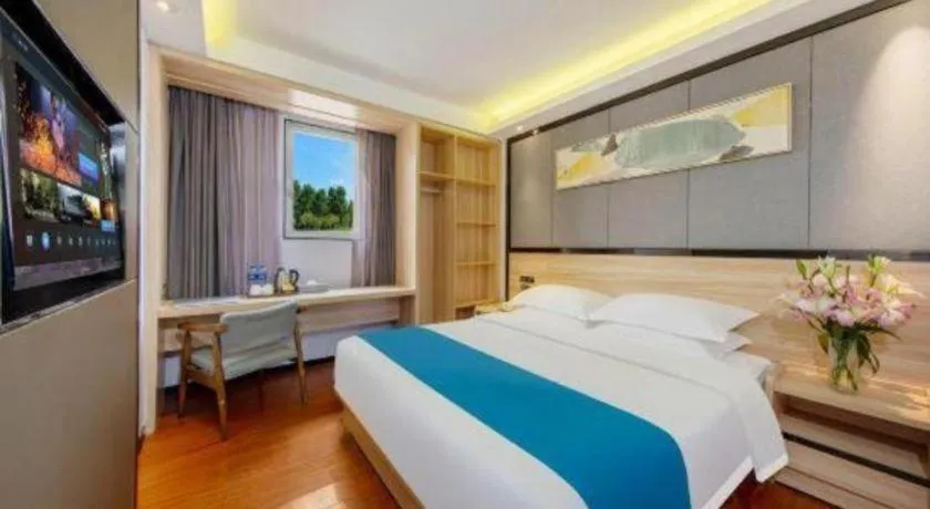 Bed in Wenxing Hotel Guangzhou Gangding Metro Station Branch