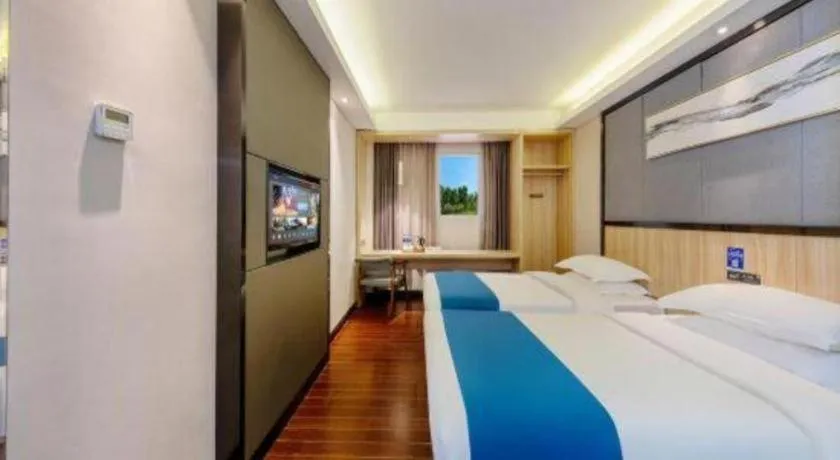 Bed in Wenxing Hotel Guangzhou Gangding Metro Station Branch