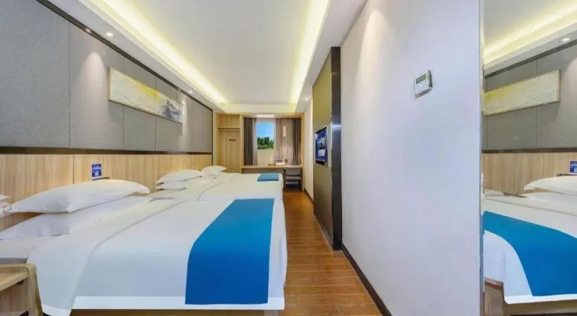 Bed in Wenxing Hotel Guangzhou Gangding Metro Station Branch