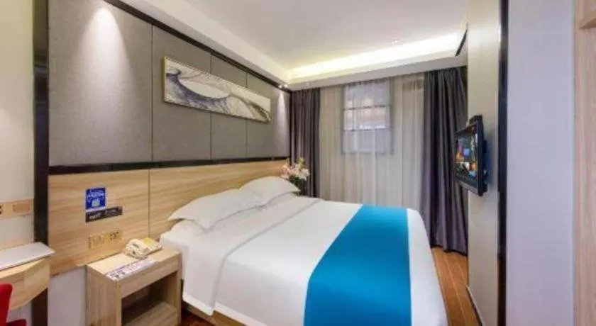 Bed in Wenxing Hotel Guangzhou Gangding Metro Station Branch