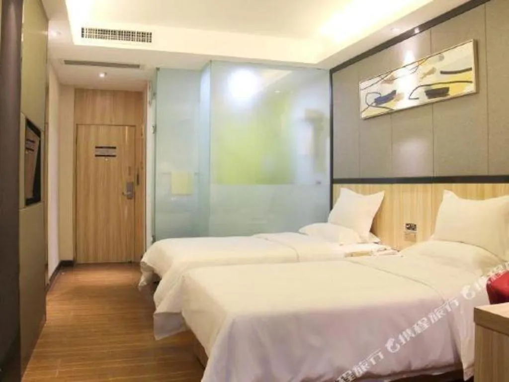Bed in Wenxing Hotel Guangzhou Gangding Metro Station Branch