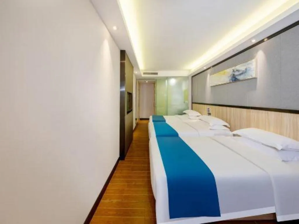 Bed in Wenxing Hotel Guangzhou Gangding Metro Station Branch