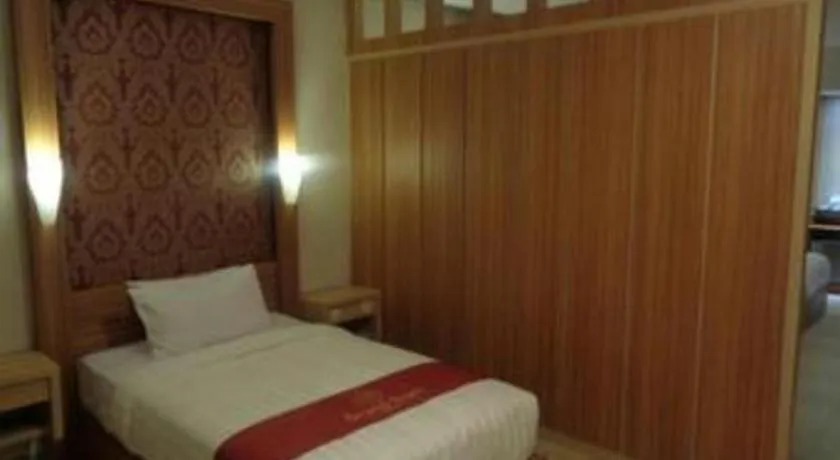 Bed in Grand Dian Hotel Slawi