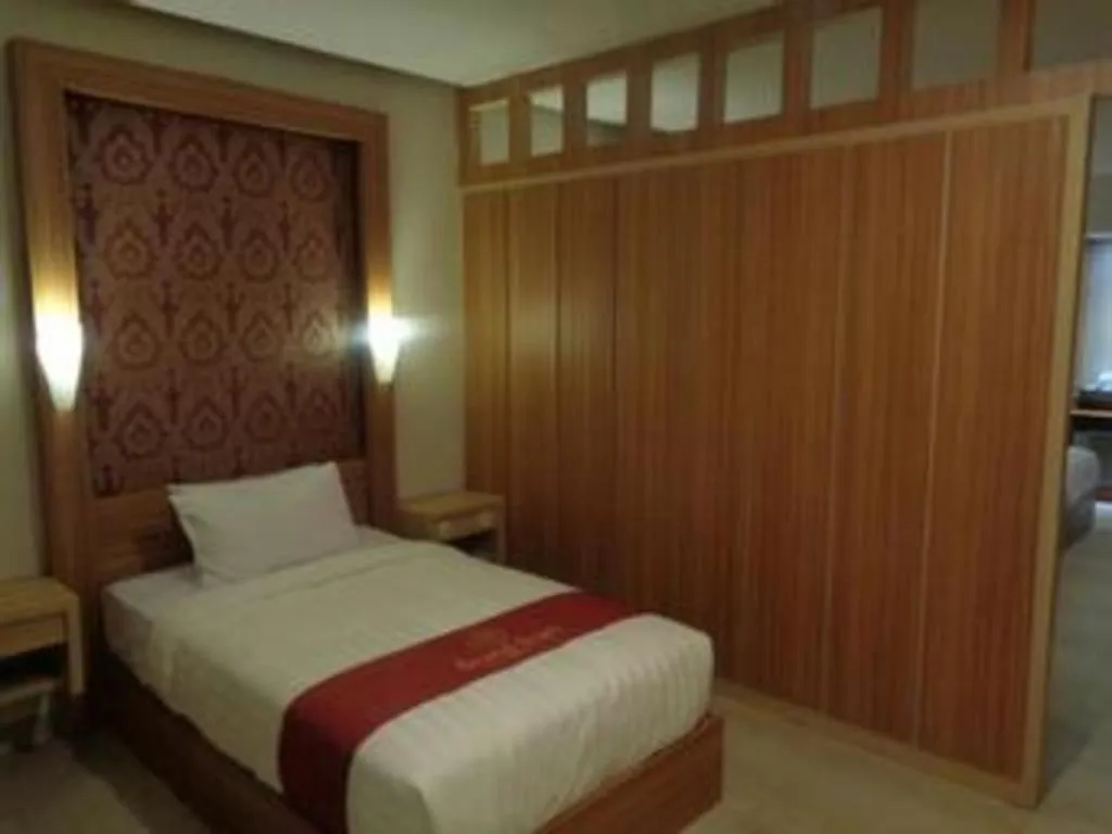 Bed in Grand Dian Hotel Slawi
