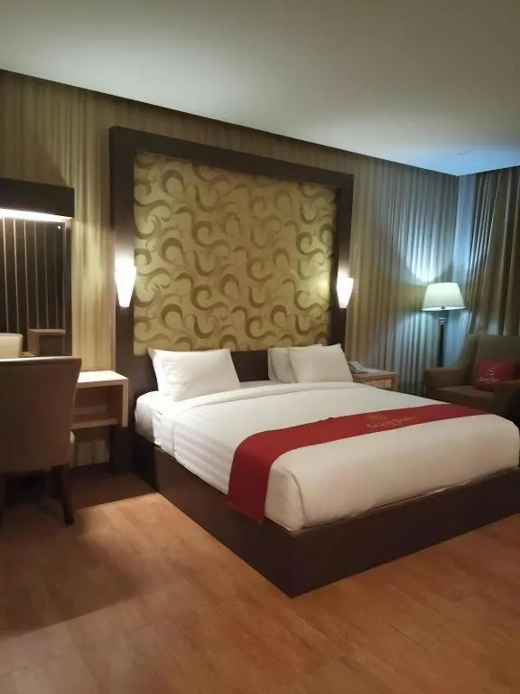 Bed in Grand Dian Hotel Slawi