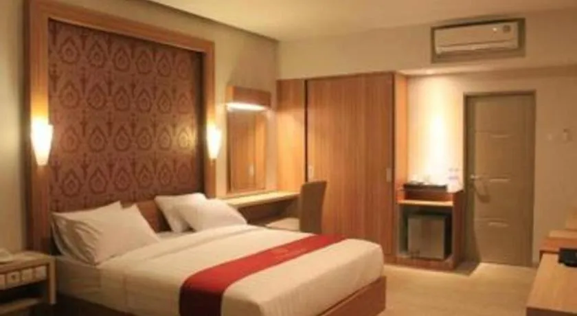 Bed in Grand Dian Hotel Slawi