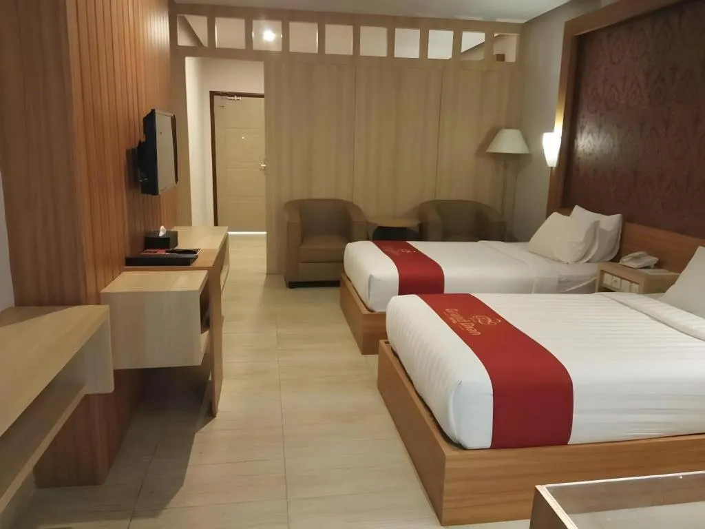 Bed in Grand Dian Hotel Slawi