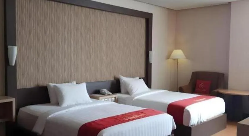 Bed in Grand Dian Hotel Slawi