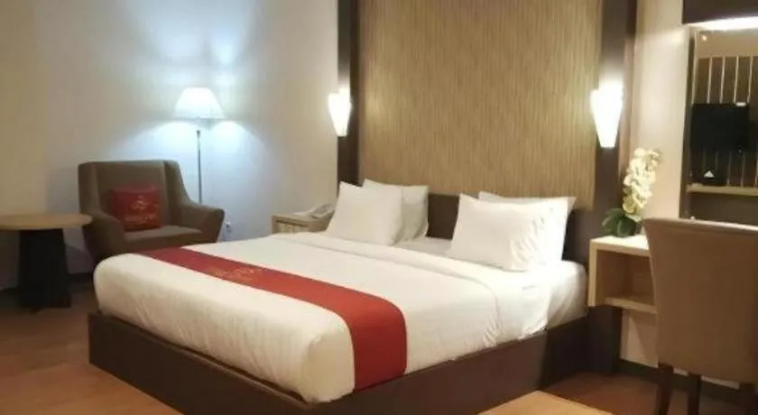Bed in Grand Dian Hotel Slawi