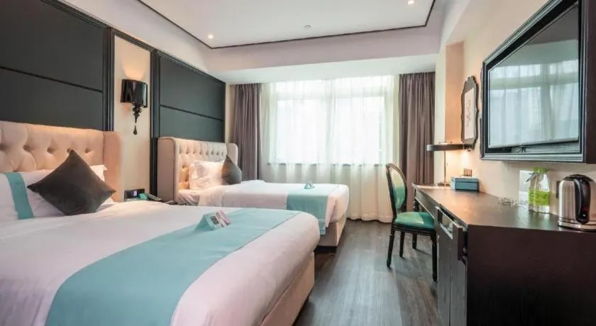 Bed in Xana Hotelle·Xiamen Railway Station