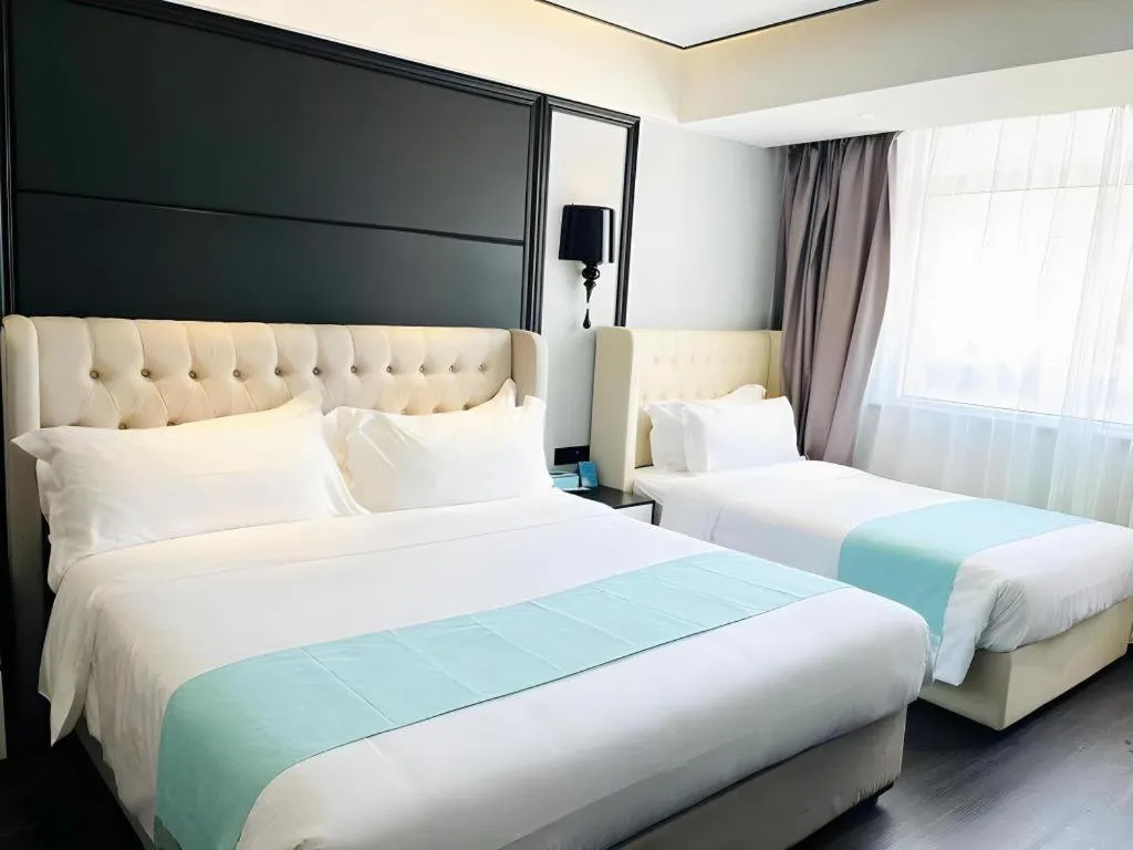 Bed in Xana Hotelle·Xiamen Railway Station