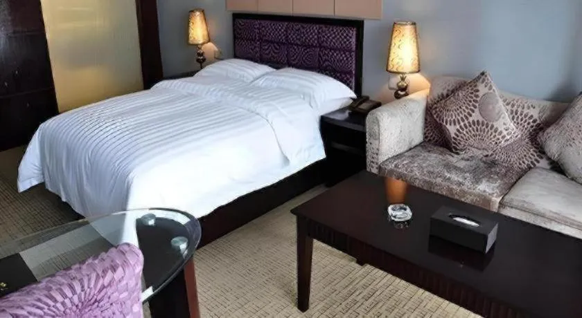 Bed in Oriental Hotel