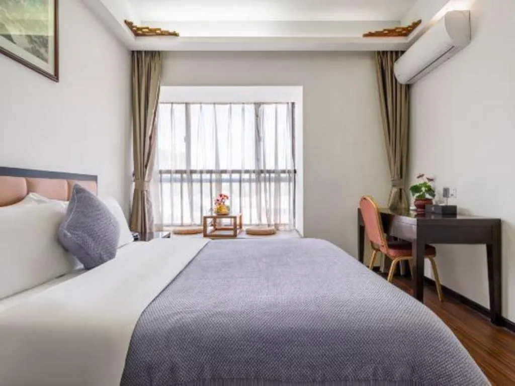 Bed in Oriental Hotel