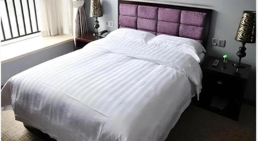 Bed in Oriental Hotel