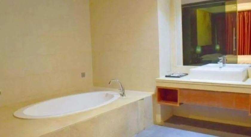 Bed in Oriental Hotel