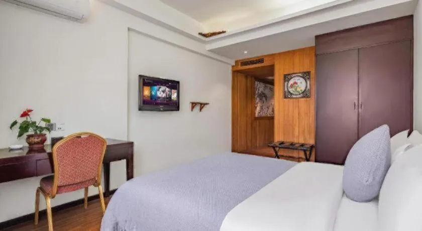 Bed in Oriental Hotel