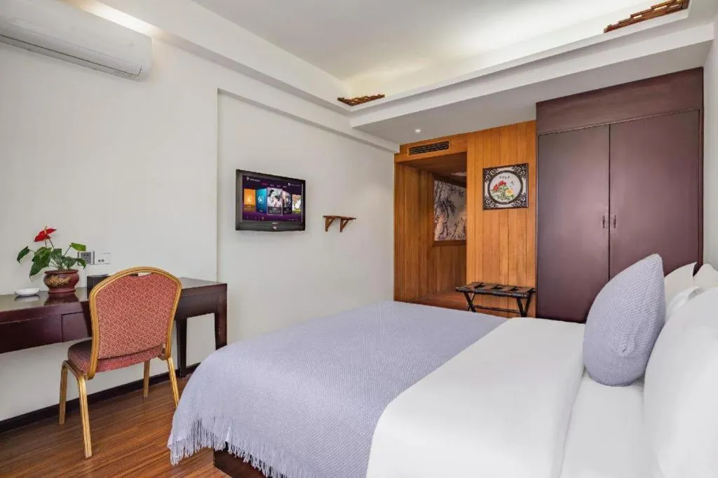 Bed in Oriental Hotel