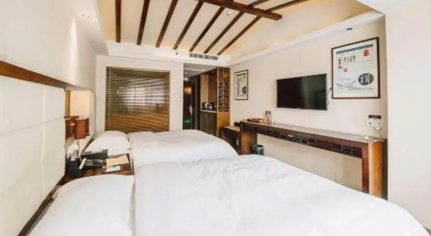 Bed in Oriental Hotel