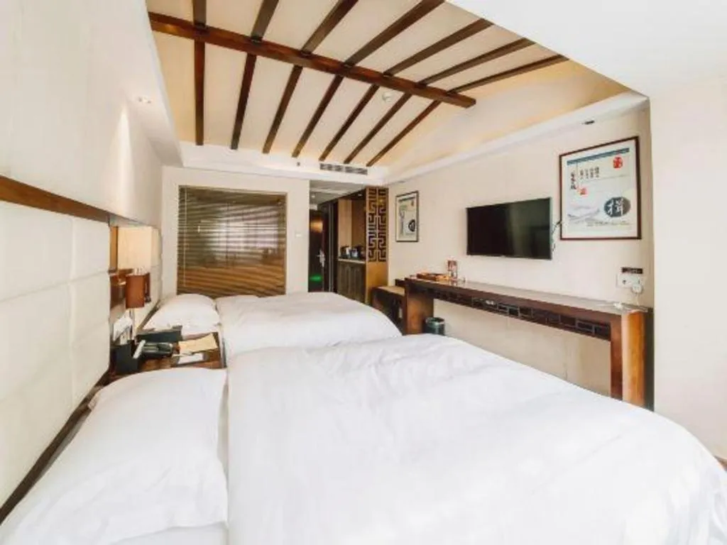 Bed in Oriental Hotel