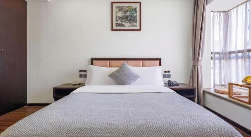 Bed in Oriental Hotel